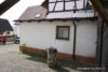 # Wunderschönes Grundstück mit Traumgarten: mit Garage, Scheune und altem Bauernhaus ! - gepflasterter Hof mit Garage